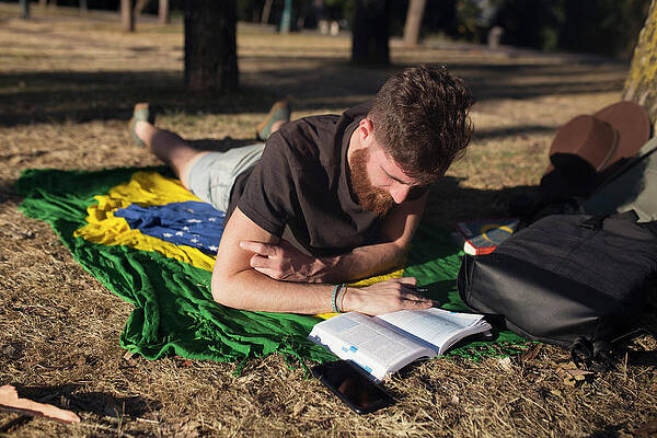 Man Reading A Book In A Park #3 Print
