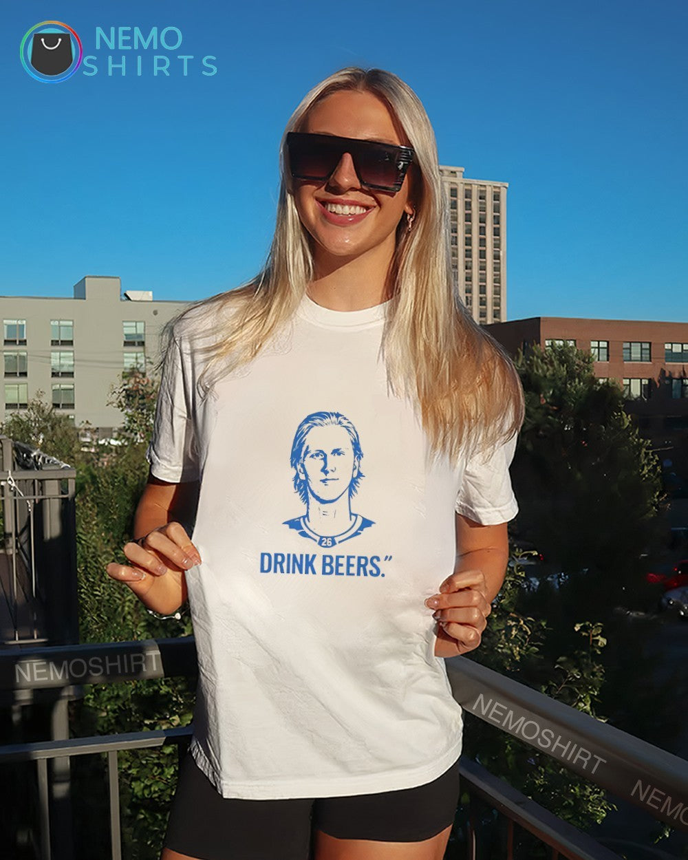 Sam Carrick wearing drink beers Rasmus Dahlin Buffalo Sabres shirt