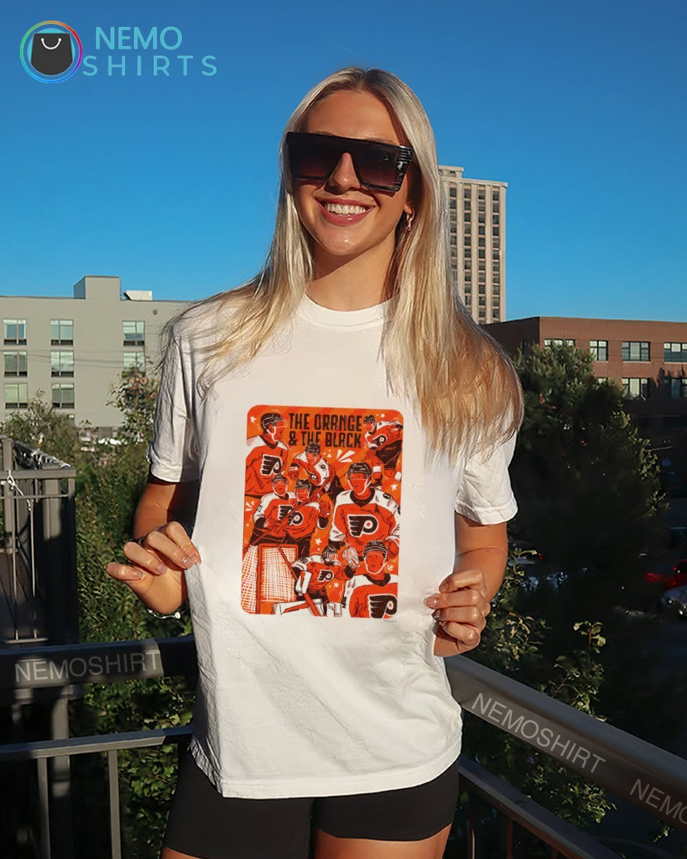 The orange and the black Philadelphia Flyers shirt