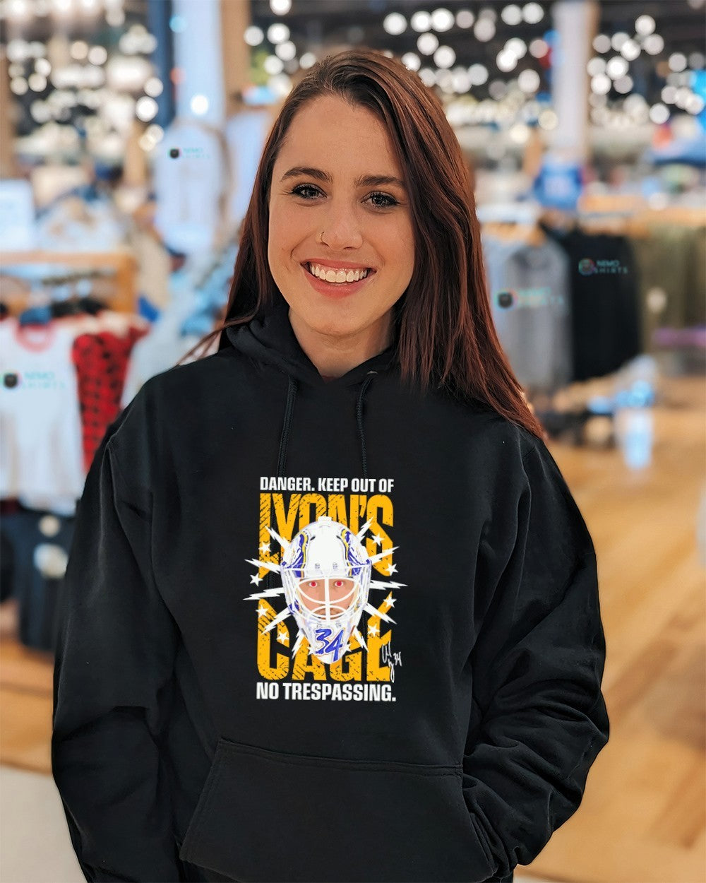 Lyon’s Cage Alex Lyon Buffalo Sabres goaltender danger keep out of no trespassing signature shirt