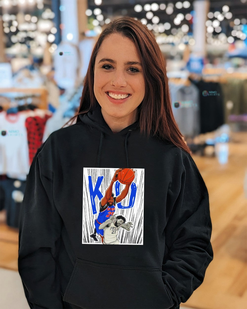NY Knicks Jalen Brunson dunk on Sixers Joel Embiid shirt