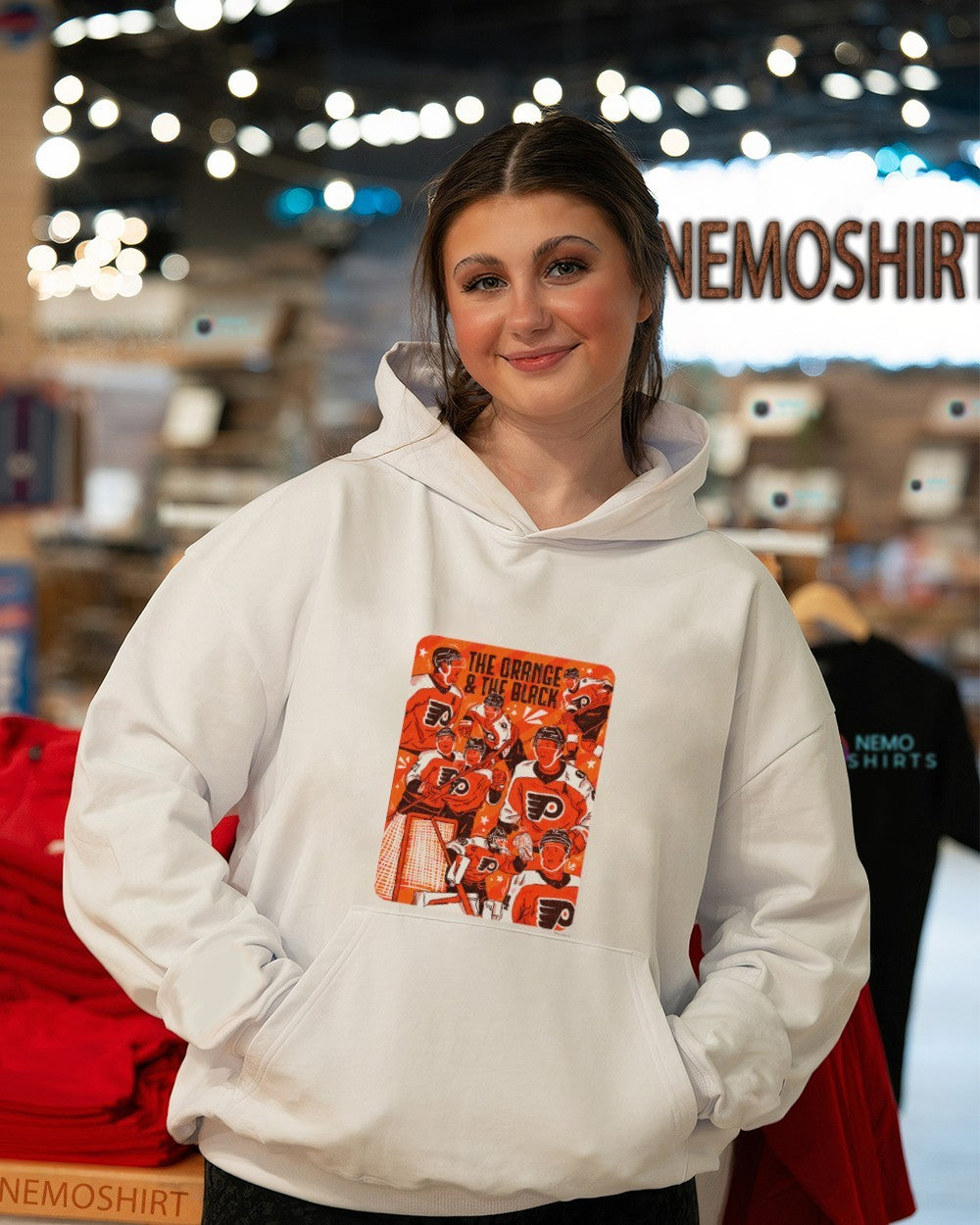 The orange and the black Philadelphia Flyers shirt