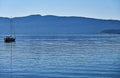 Serene Blue Day With Sailboat Print