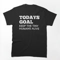 Todays Goal, Keep The Tiny Humans Alive. Funny Mom Life and Parenting Quote. White by That Cheeky Tee