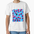 Red cherries on light blue background by imagenia