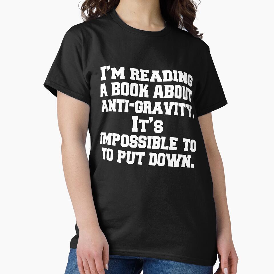 Funny Sarcastic Pun Humor I'm Reading A Book About Anti-gravity. It's Impossible To Put Down by fantasticdesign