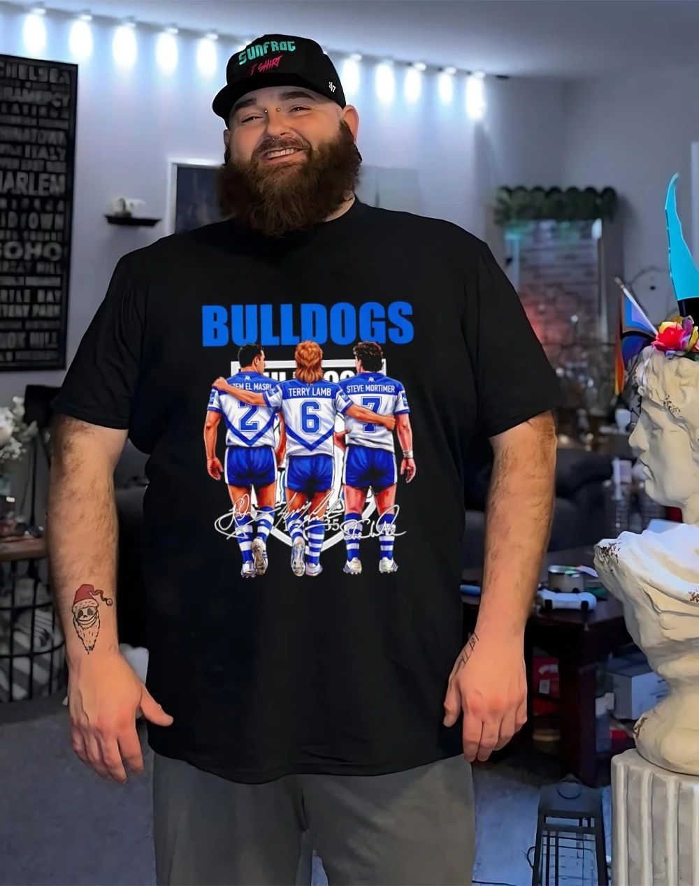 Canterbury-Bankstown Bulldogs players behind signatures shirt