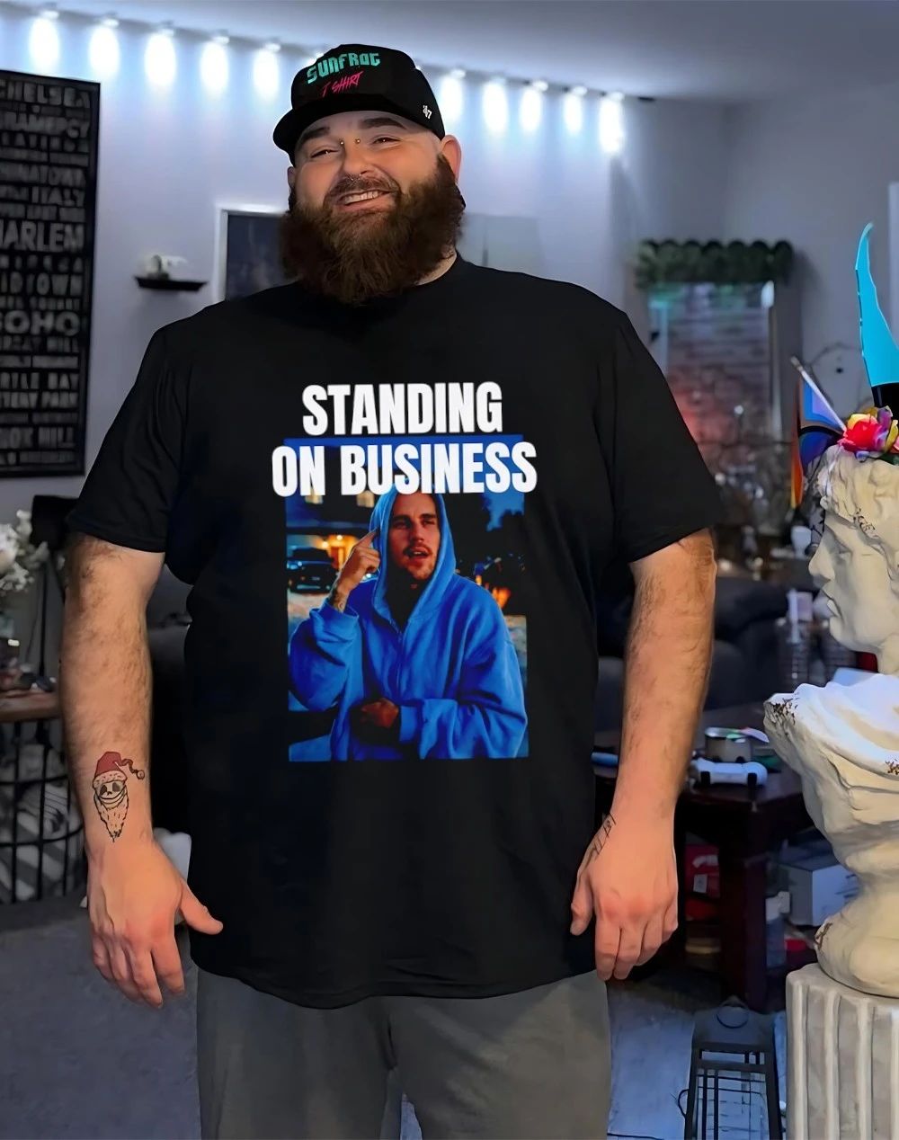 Justin standing on business shirt