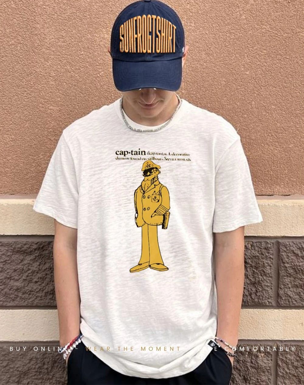 Madelyn Cline wearing Captain definition decorative dummy found on sailboats shirt
