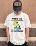 Note to self don’t sit on the floor without a solid plan on how to get up again Minion shirt