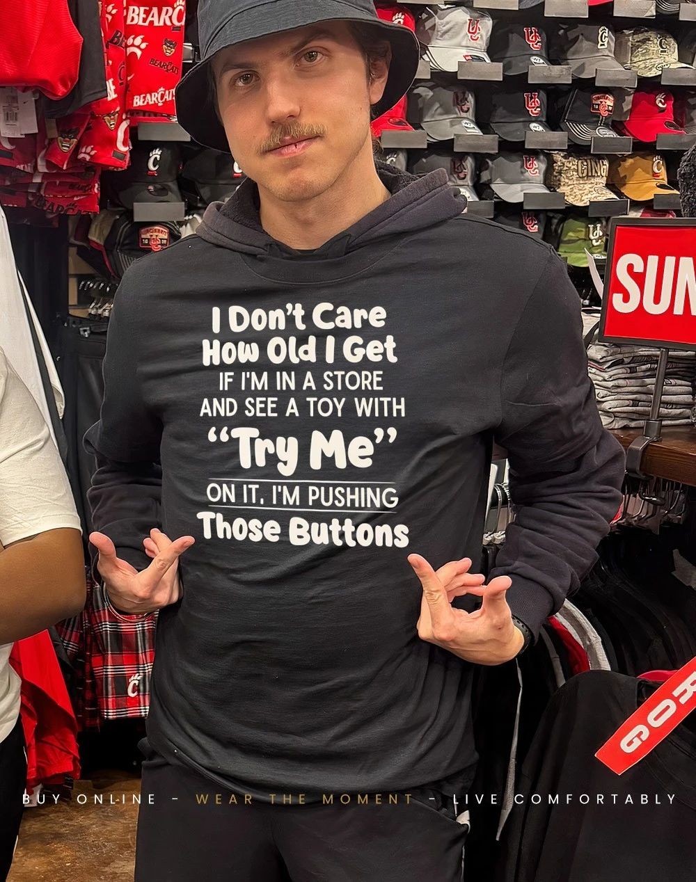 I don’t care how old I get if I’m in a store and see a του with try me on it I’m pushing those buttons shirt