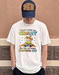 I try to contain my crazy but the lid keeps popping off Minion shirt