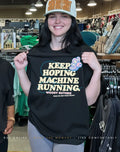 Woody Guthrie keep hoping machine running from his new years rulin’s shirt